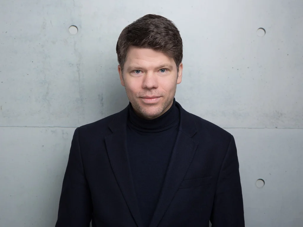 Fridolin Hadelich, D.E.S.S.